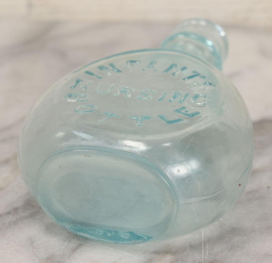 Lot 031 - Antique Clear Glass Infants Nursing Bottle With I.N.B. Monogram, 5-1/2" Height
