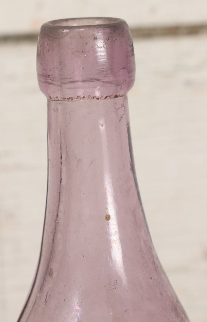 Lot 032 - Antique Purple Glass Bottle From Thos. Grimes & Bro. Inc., Providence, Rhode Island, 9" Height