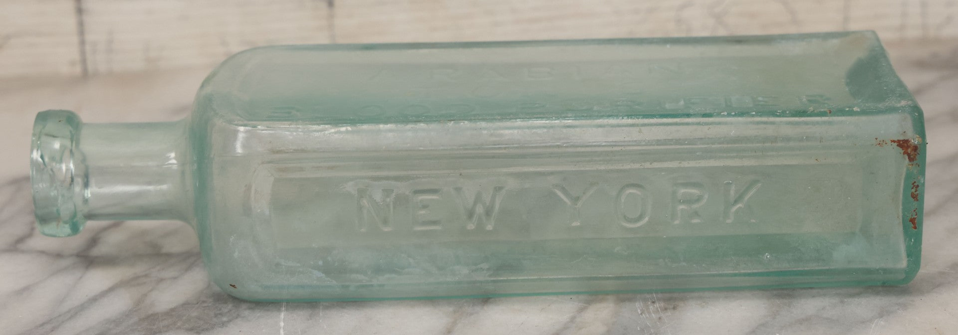 Lot 033 - Antique Stewart D. Howe's Arabian Tonic Blood Purifier Patent Medicine Apothecary Glass Bottle, New York, With Embossed Lettering, 9-3/8" Height