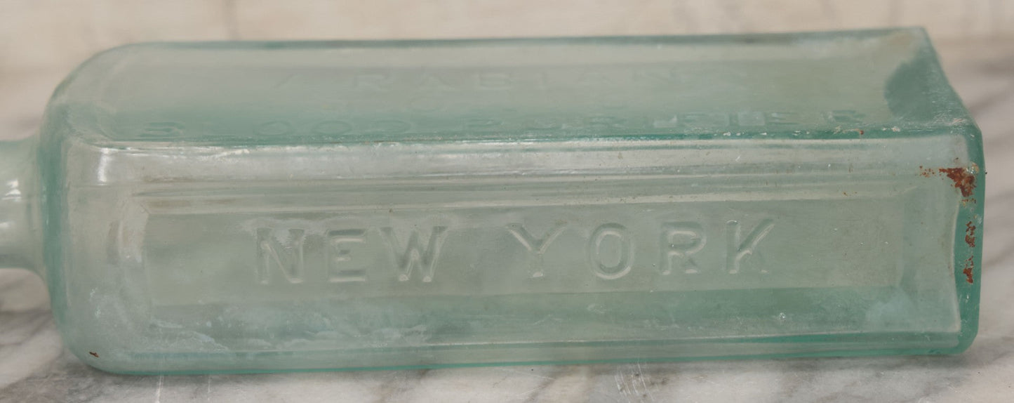 Lot 033 - Antique Stewart D. Howe's Arabian Tonic Blood Purifier Patent Medicine Apothecary Glass Bottle, New York, With Embossed Lettering, 9-3/8" Height