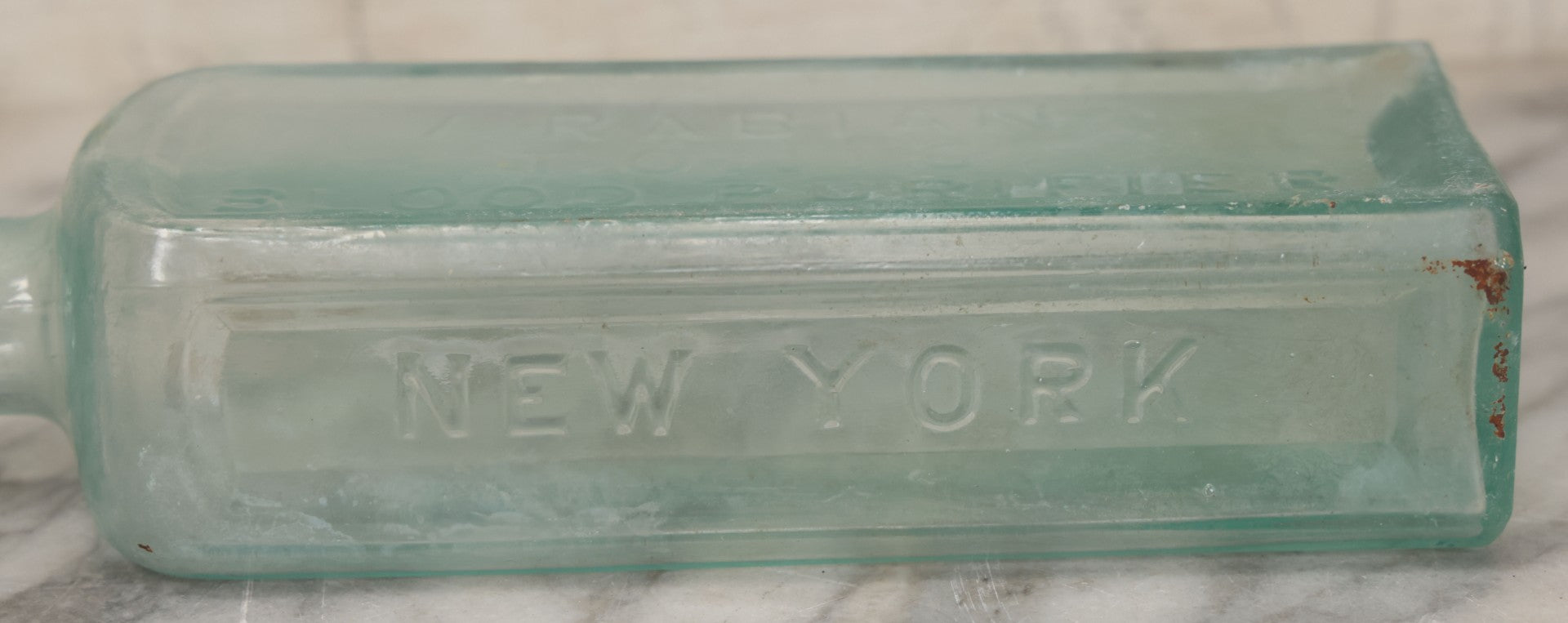 Lot 033 - Antique Stewart D. Howe's Arabian Tonic Blood Purifier Patent Medicine Apothecary Glass Bottle, New York, With Embossed Lettering, 9-3/8" Height