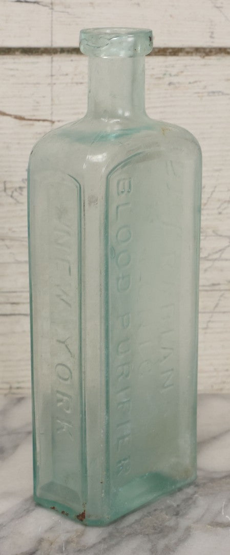 Lot 033 - Antique Stewart D. Howe's Arabian Tonic Blood Purifier Patent Medicine Apothecary Glass Bottle, New York, With Embossed Lettering, 9-3/8" Height