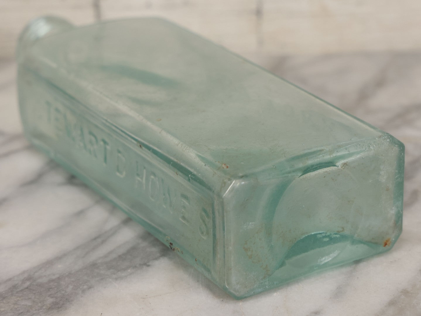 Lot 033 - Antique Stewart D. Howe's Arabian Tonic Blood Purifier Patent Medicine Apothecary Glass Bottle, New York, With Embossed Lettering, 9-3/8" Height