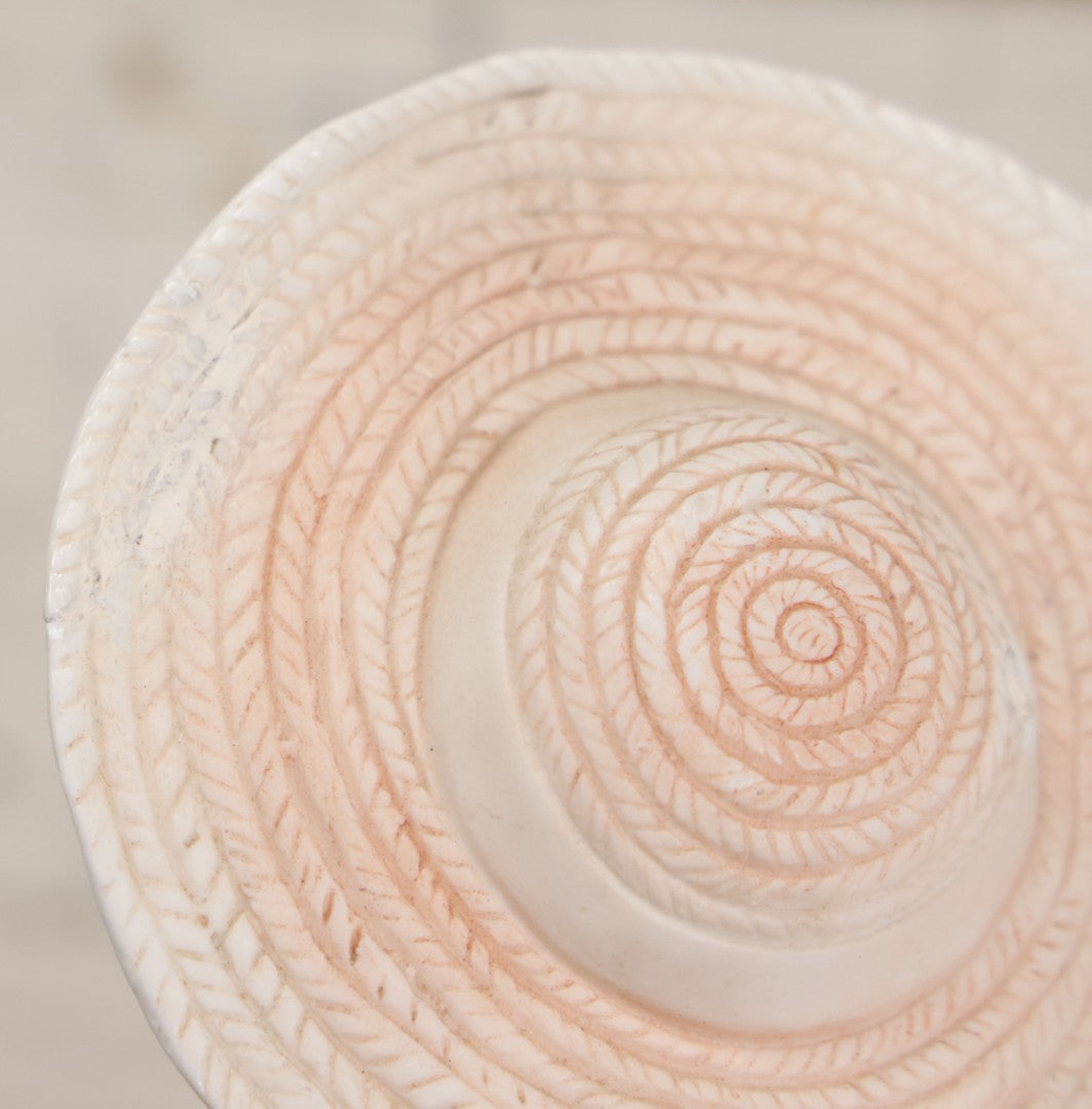 Lot 037 - Vintage Bisque Statue Of Young Blond Child In Large Straw Hat Sitting By Shore With Pail, With Pink Painted Details And Gold Embellishments, Note Chip, Repairs, 12" Height