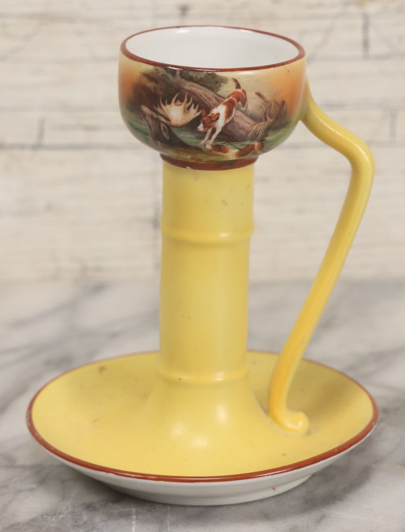Lot 038 - Antique Yellow Painted Candlestick With Hunting Dogs Attacking Swimming Moose Motif, Manufactured By Royal Bayreuth, Bavaria, 5-3/8" Height