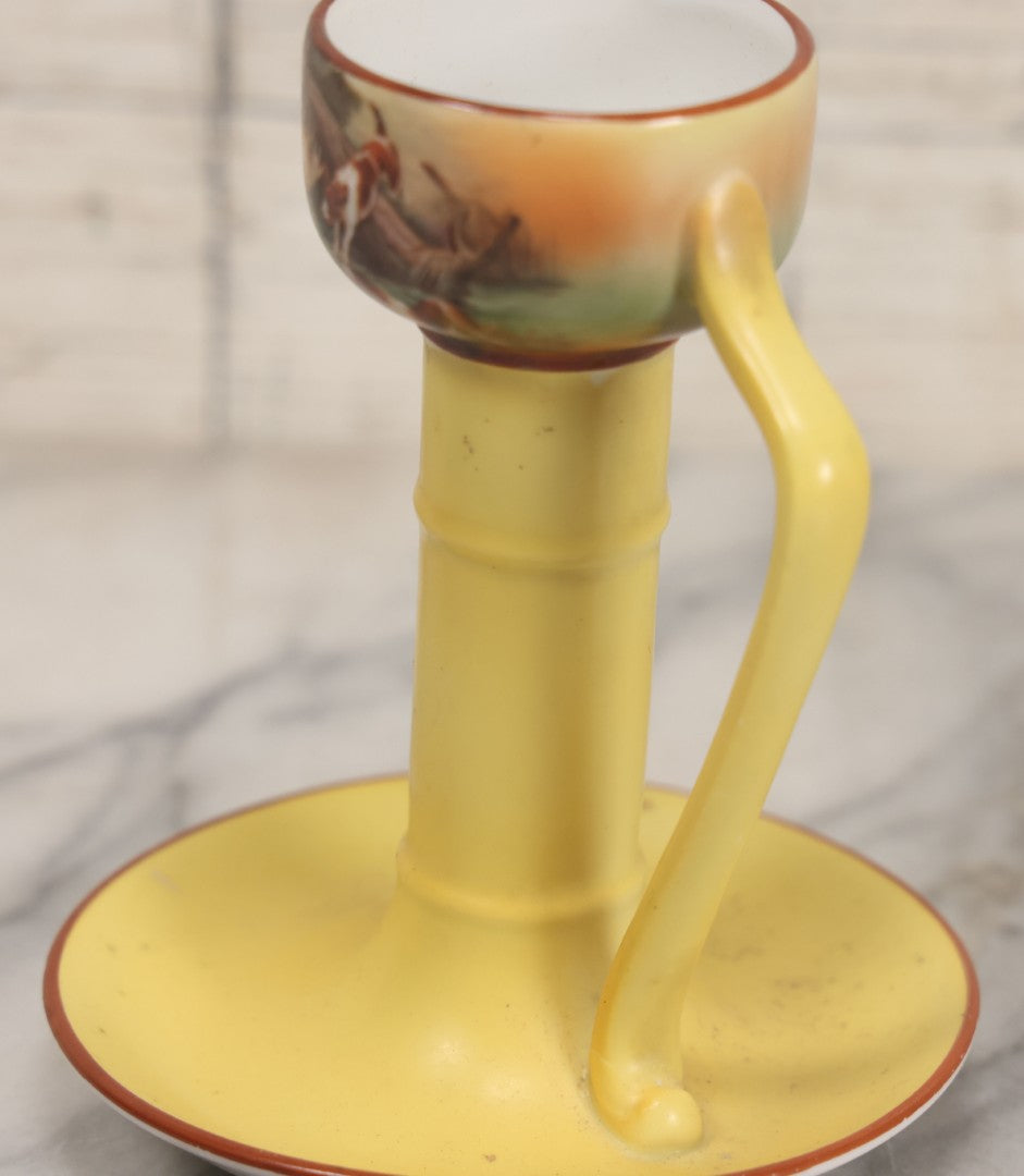 Lot 038 - Antique Yellow Painted Candlestick With Hunting Dogs Attacking Swimming Moose Motif, Manufactured By Royal Bayreuth, Bavaria, 5-3/8" Height
