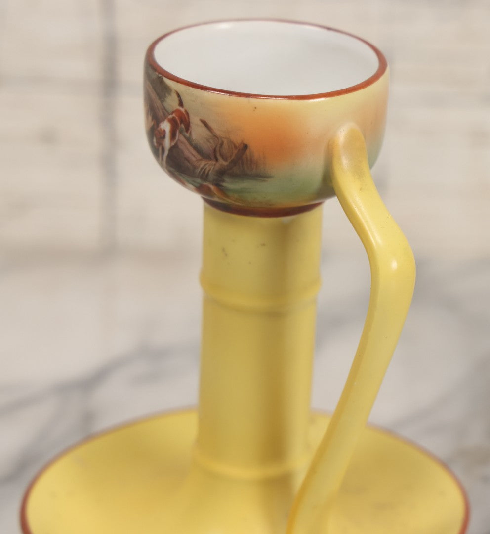 Lot 038 - Antique Yellow Painted Candlestick With Hunting Dogs Attacking Swimming Moose Motif, Manufactured By Royal Bayreuth, Bavaria, 5-3/8" Height
