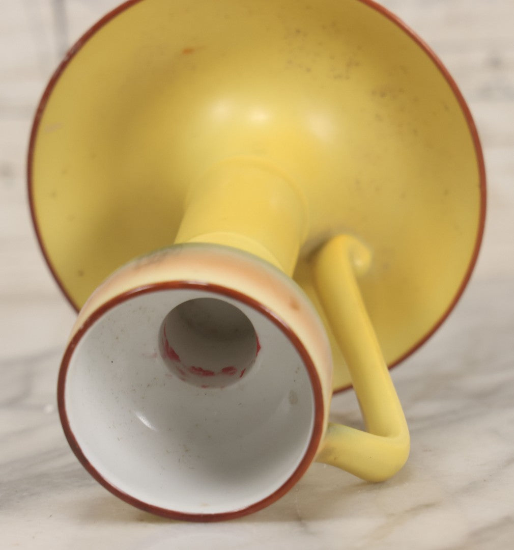 Lot 038 - Antique Yellow Painted Candlestick With Hunting Dogs Attacking Swimming Moose Motif, Manufactured By Royal Bayreuth, Bavaria, 5-3/8" Height