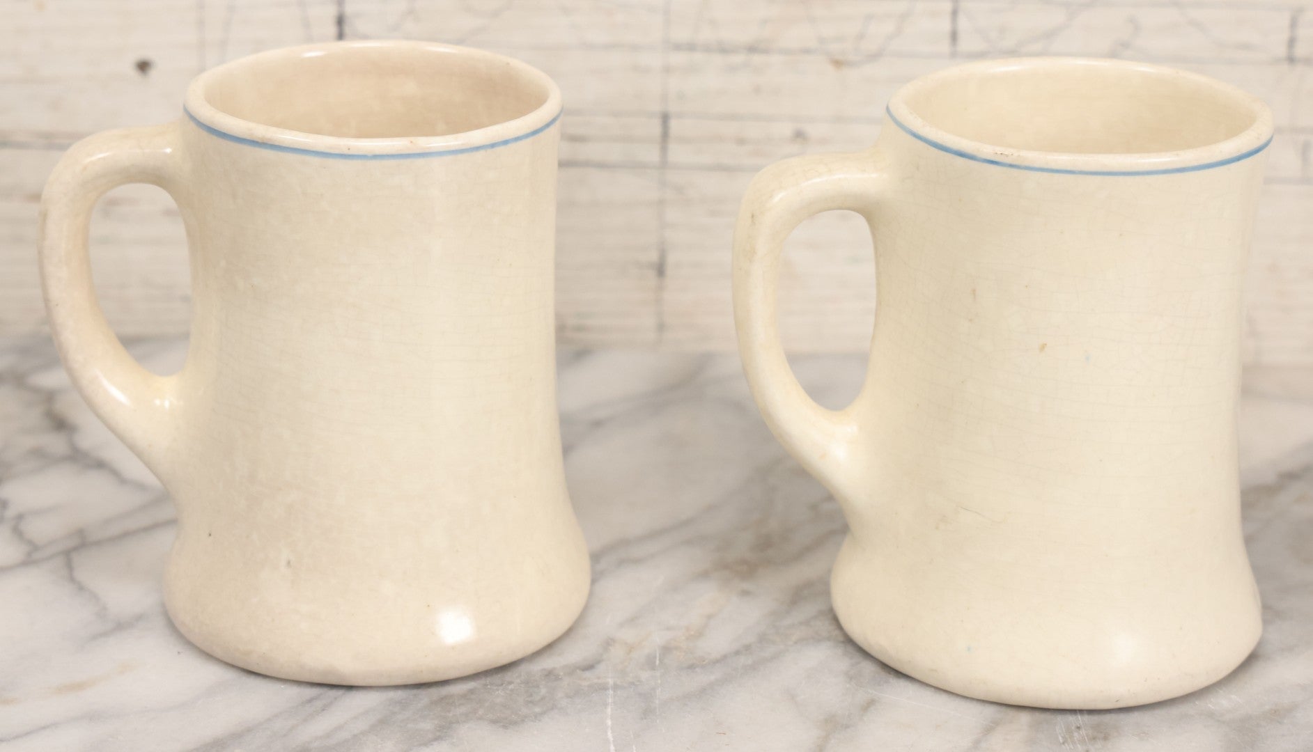 Lot 040 - Pair Of Antique Mugs With Image Of Dutch Children In Clogs Playing With Their Kitten, Windmill In Background