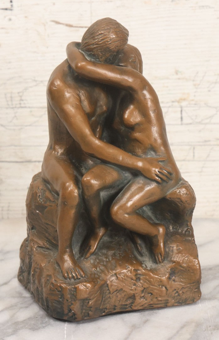Lot 042 - Vintage Bronze Chalkware Status Of Nude Man And Woman In Lovers Embrace After "The Kiss" By Auguste Rodin, Manufactured By Q.A.C. Finelli, Copyright 1964, 8-1/4" Height