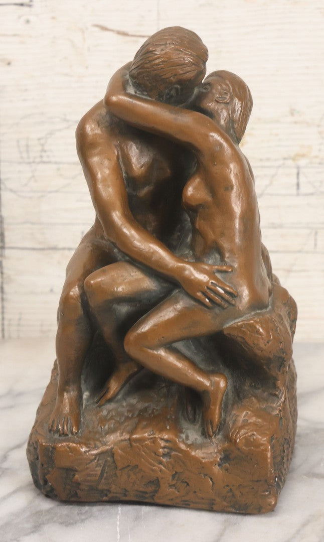 Lot 042 - Vintage Bronze Chalkware Status Of Nude Man And Woman In Lovers Embrace After "The Kiss" By Auguste Rodin, Manufactured By Q.A.C. Finelli, Copyright 1964, 8-1/4" Height