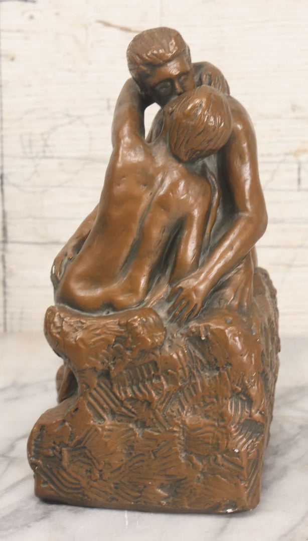 Lot 042 - Vintage Bronze Chalkware Status Of Nude Man And Woman In Lovers Embrace After "The Kiss" By Auguste Rodin, Manufactured By Q.A.C. Finelli, Copyright 1964, 8-1/4" Height