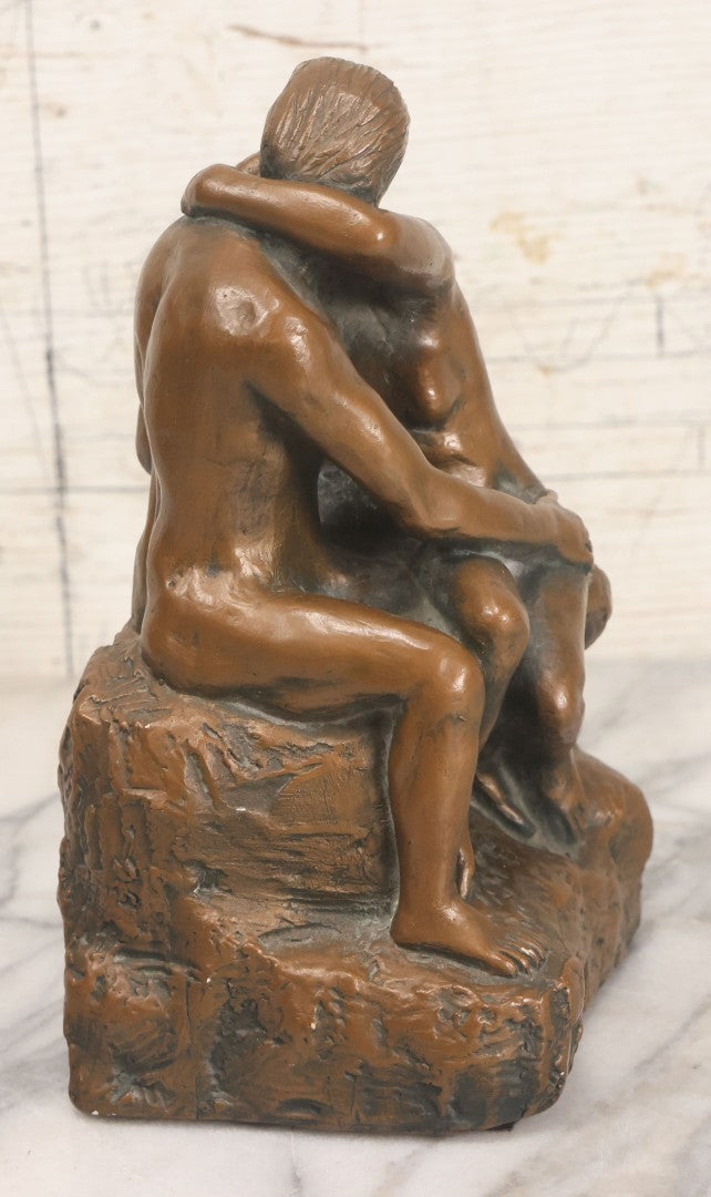 Lot 042 - Vintage Bronze Chalkware Status Of Nude Man And Woman In Lovers Embrace After "The Kiss" By Auguste Rodin, Manufactured By Q.A.C. Finelli, Copyright 1964, 8-1/4" Height
