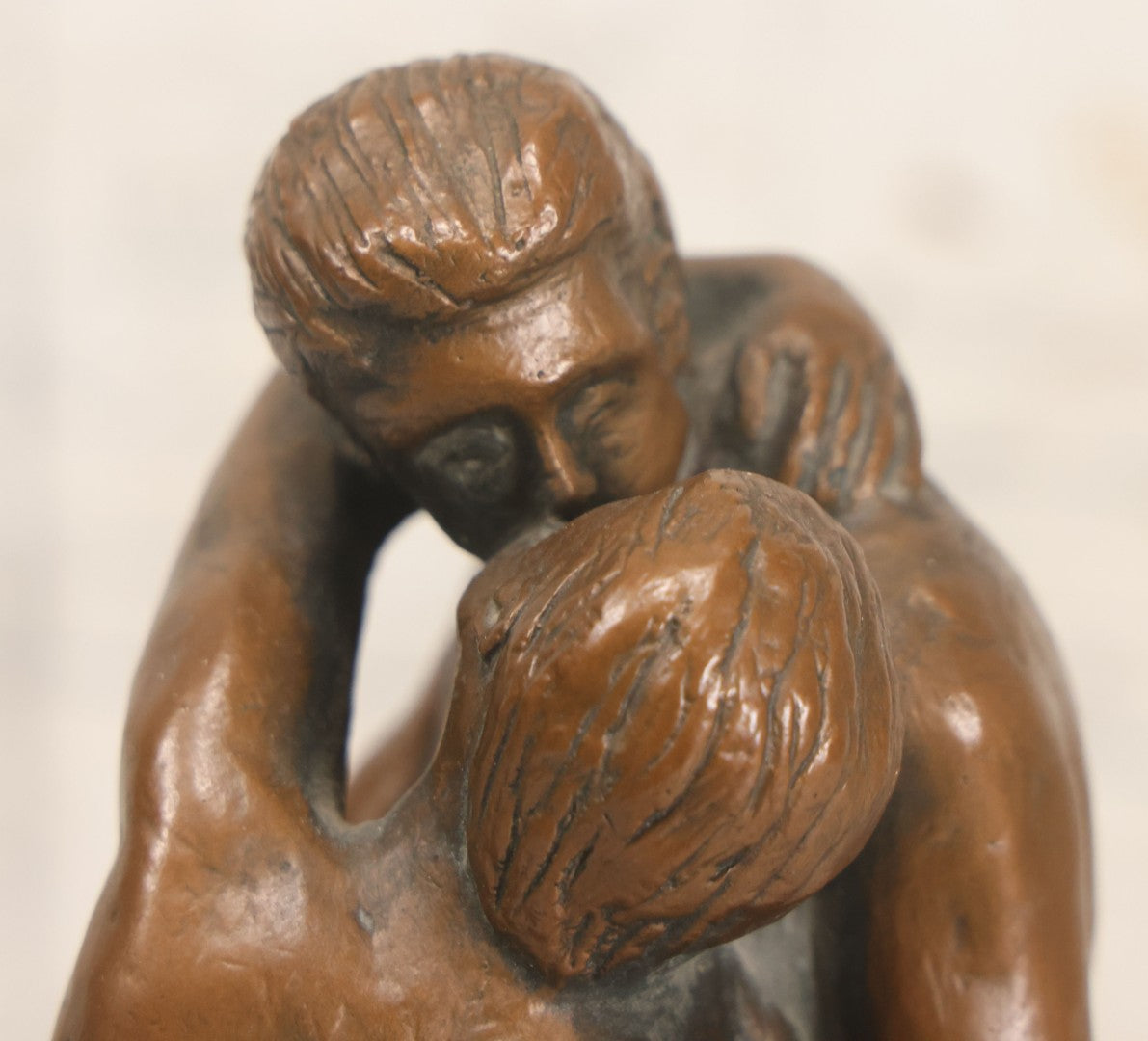 Lot 042 - Vintage Bronze Chalkware Status Of Nude Man And Woman In Lovers Embrace After "The Kiss" By Auguste Rodin, Manufactured By Q.A.C. Finelli, Copyright 1964, 8-1/4" Height