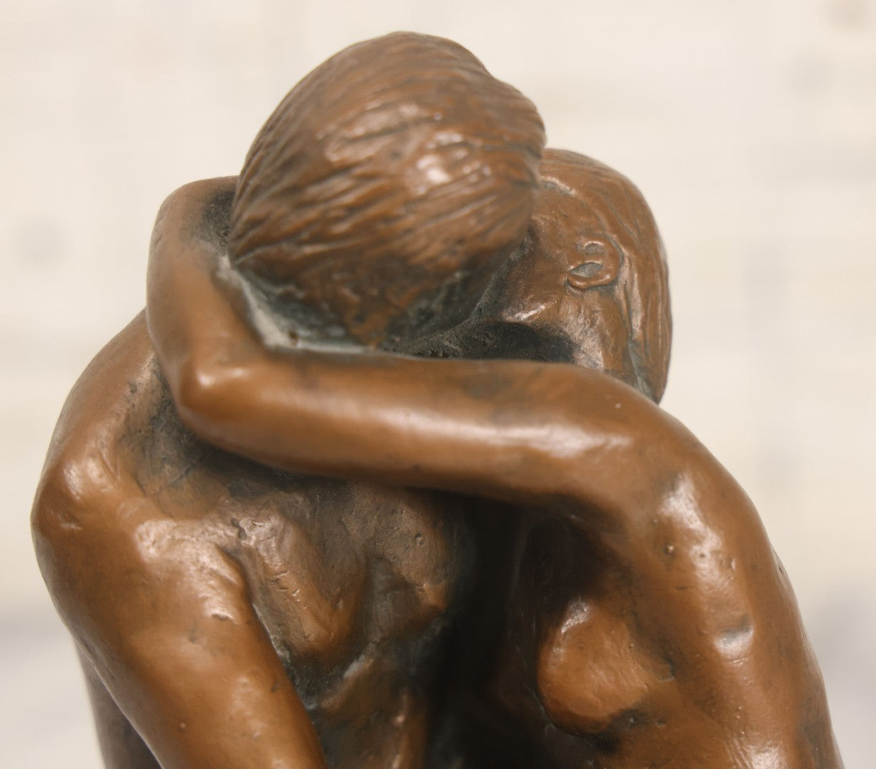 Lot 042 - Vintage Bronze Chalkware Status Of Nude Man And Woman In Lovers Embrace After "The Kiss" By Auguste Rodin, Manufactured By Q.A.C. Finelli, Copyright 1964, 8-1/4" Height