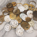 Lot 048 - Mixed Antique Salvage Grouping Of Pocket Watch Parts Including Porcelein Clock Faces, Movements, And Case Parts, 35+ Pieces, Makers Include J.F. Cooper, William Favre, F. Huquenm, M.J. Tobias