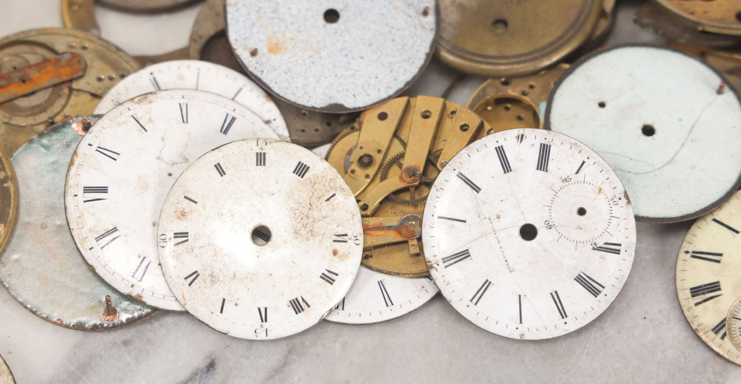 Lot 048 - Mixed Antique Salvage Grouping Of Pocket Watch Parts Including Porcelein Clock Faces, Movements, And Case Parts, 35+ Pieces, Makers Include J.F. Cooper, William Favre, F. Huquenm, M.J. Tobias
