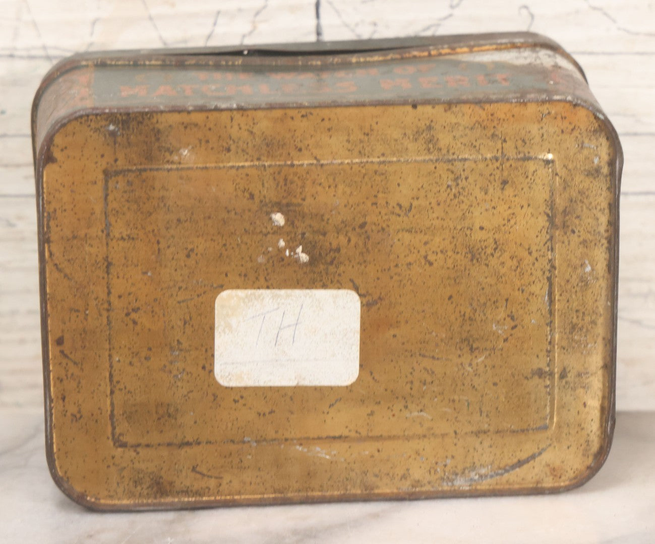 Lot 049 - Vintage Tin Lithograph Factory Agency Advertising Tin For Omega Watches, "The Watch Of Matchless Merit; Universally Guarenteed" 