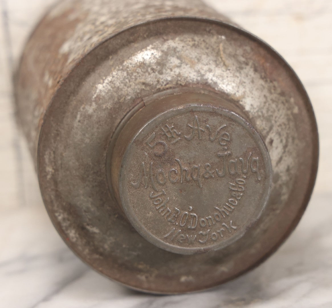 Lot 050 - Antique Coffee Tin From 5th Ave Mocha & Java, John B. O'Donohue & Co, New York, With Pinwheel Design, Note Rust, Holes