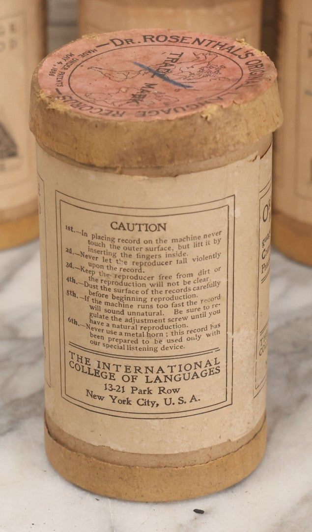 Lot 051 - Grouping Of Eight Antique "Dr. Rosenthal's Original Language Records; The Language Phone Method [...] Of Practical Linguistry," Wax Recoreds In Original Cardboard Tubes & Paper Labels, International College Of Languages, New York, Some Damaged