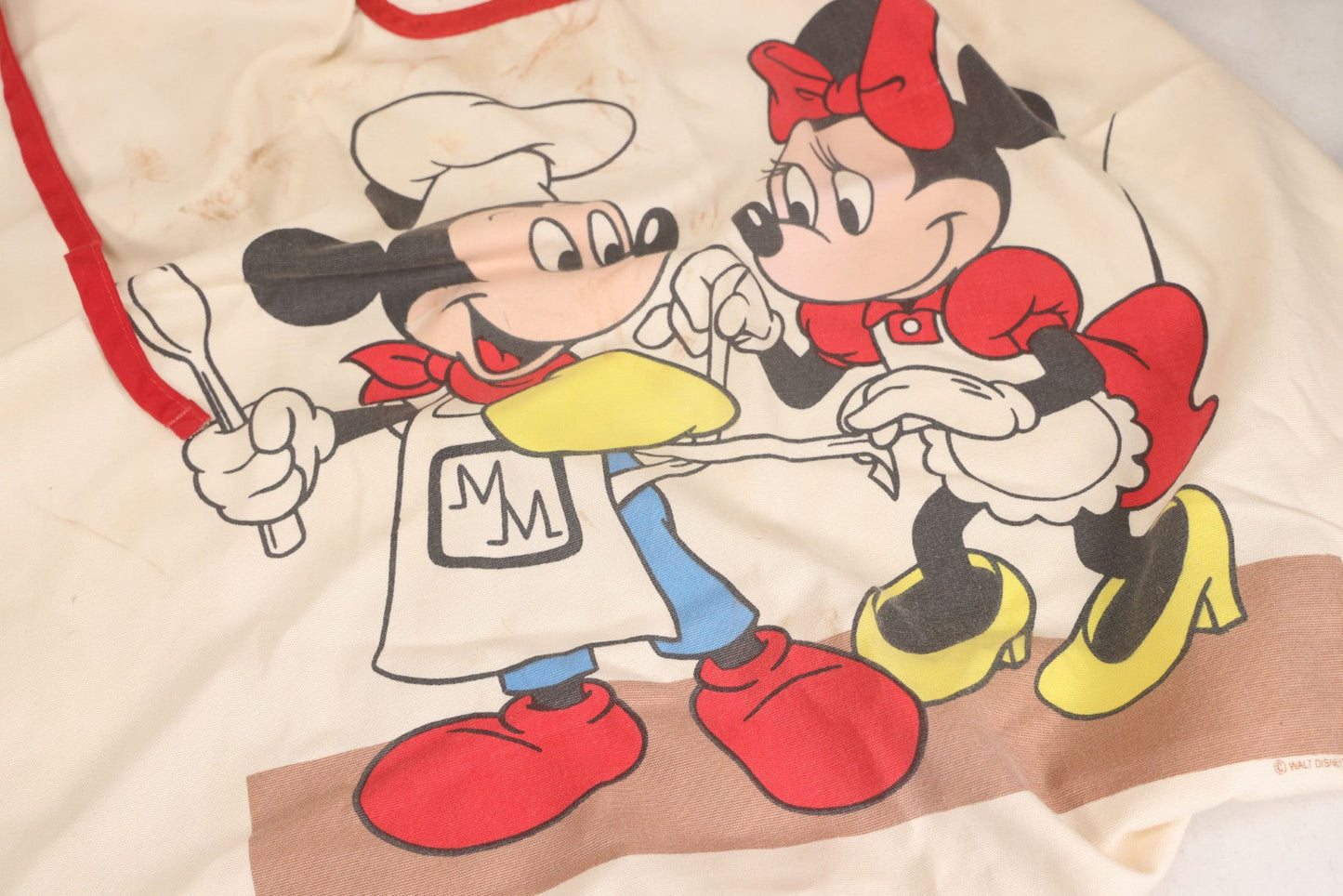 Lot 056 - Vintage Mickey And Minnie Mouse Printed Chef's Apron With Red Trim, Copyright Walt Disney Productions
