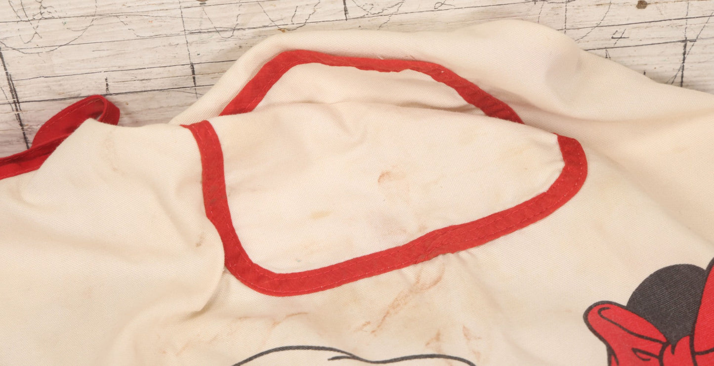 Lot 056 - Vintage Mickey And Minnie Mouse Printed Chef's Apron With Red Trim, Copyright Walt Disney Productions