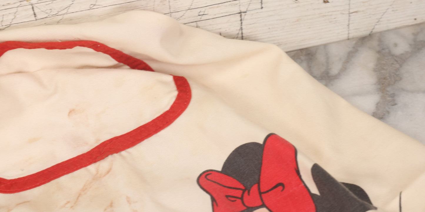 Lot 056 - Vintage Mickey And Minnie Mouse Printed Chef's Apron With Red Trim, Copyright Walt Disney Productions
