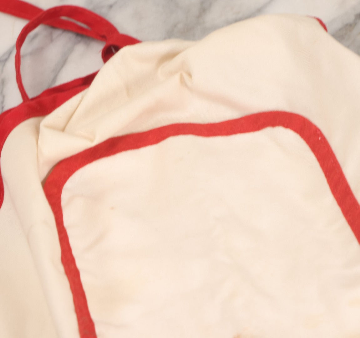 Lot 056 - Vintage Mickey And Minnie Mouse Printed Chef's Apron With Red Trim, Copyright Walt Disney Productions