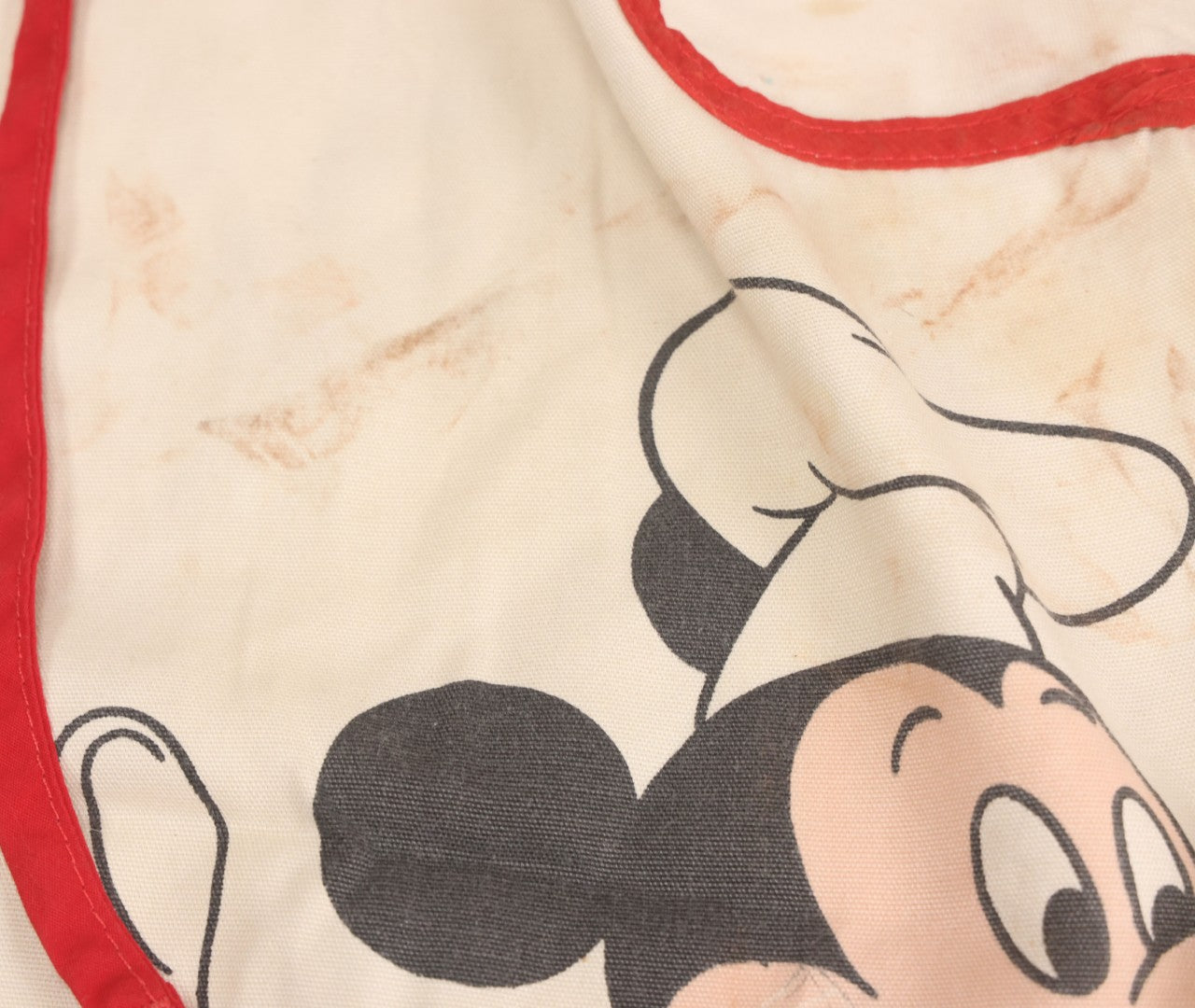 Lot 056 - Vintage Mickey And Minnie Mouse Printed Chef's Apron With Red Trim, Copyright Walt Disney Productions