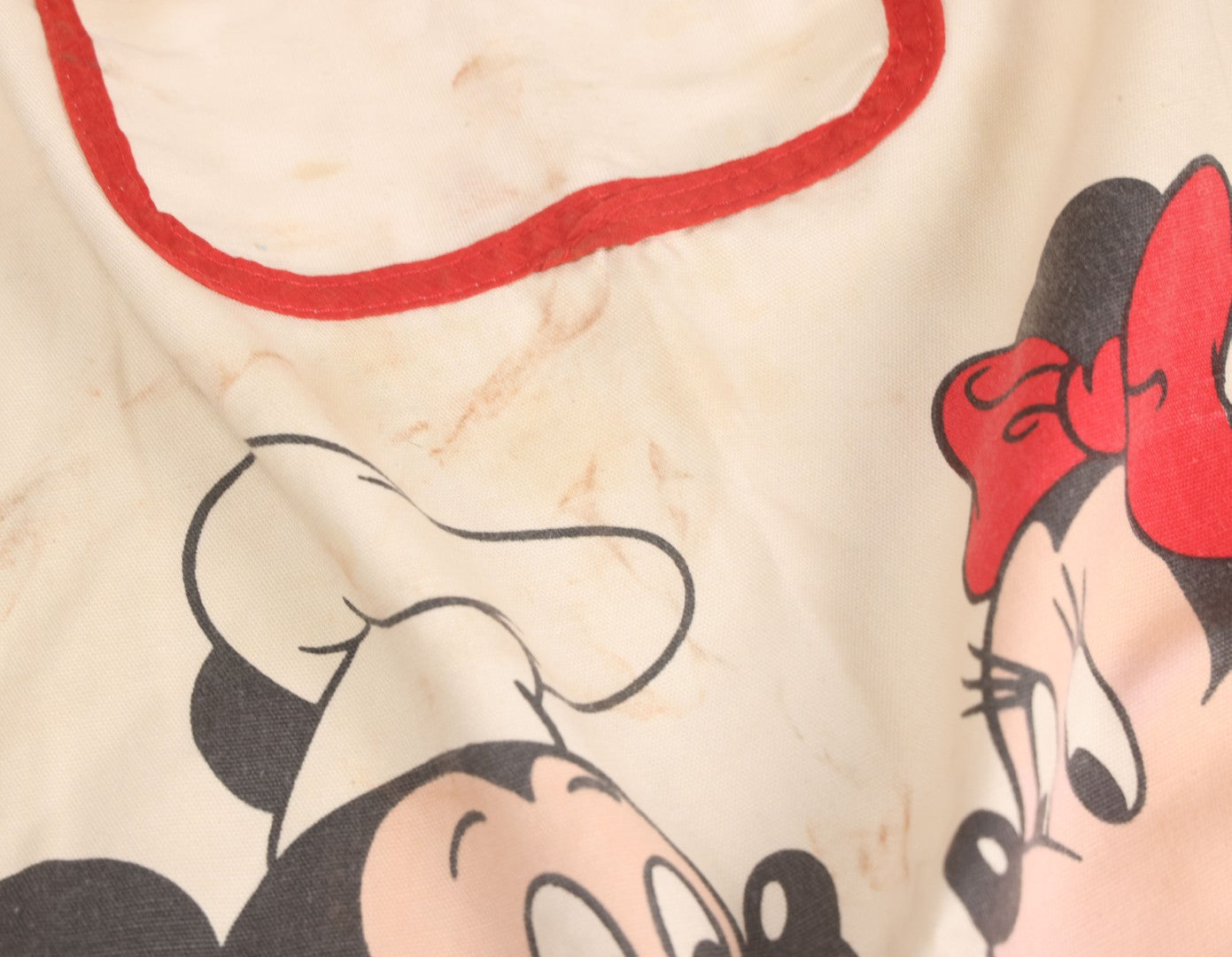 Lot 056 - Vintage Mickey And Minnie Mouse Printed Chef's Apron With Red Trim, Copyright Walt Disney Productions