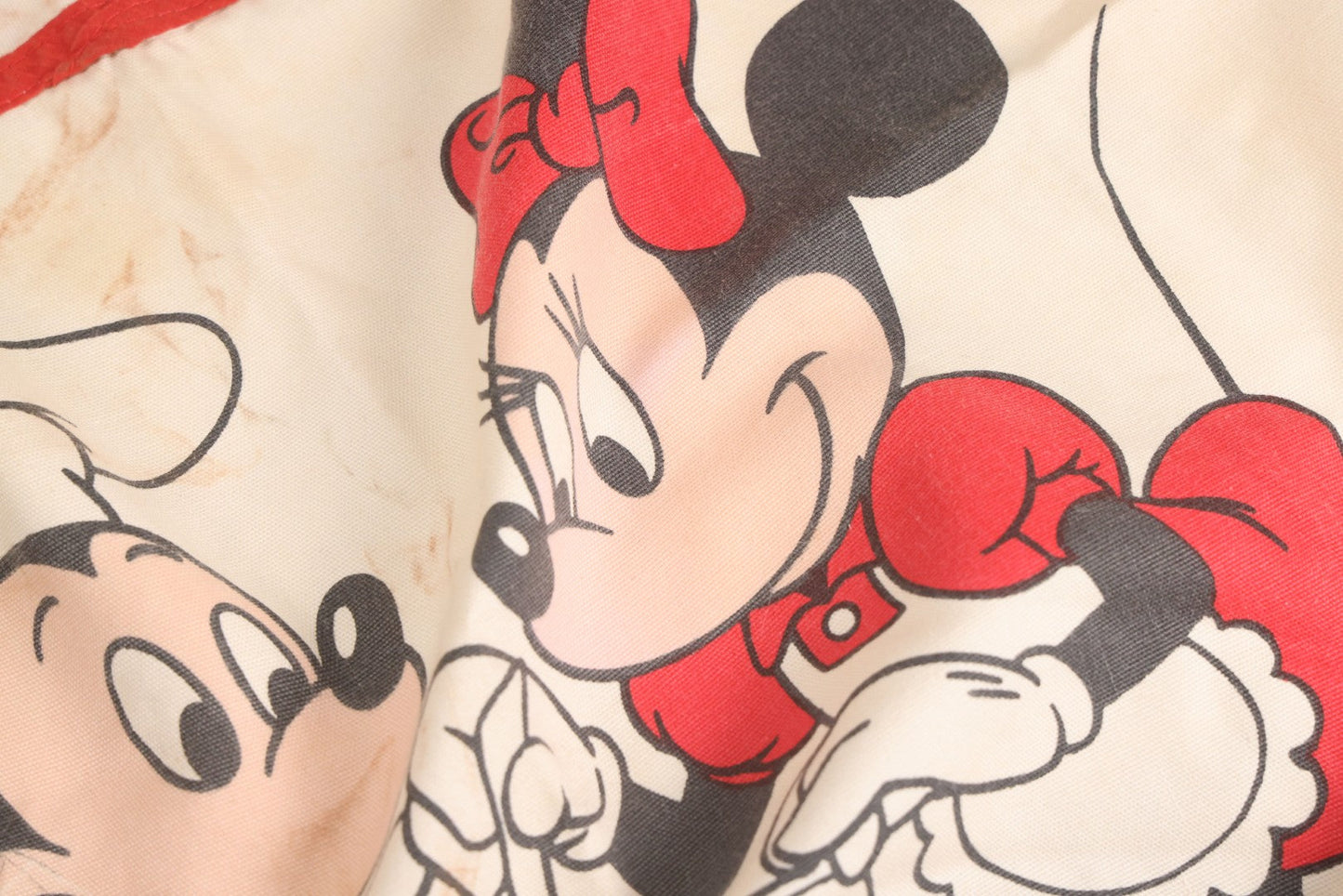 Lot 056 - Vintage Mickey And Minnie Mouse Printed Chef's Apron With Red Trim, Copyright Walt Disney Productions