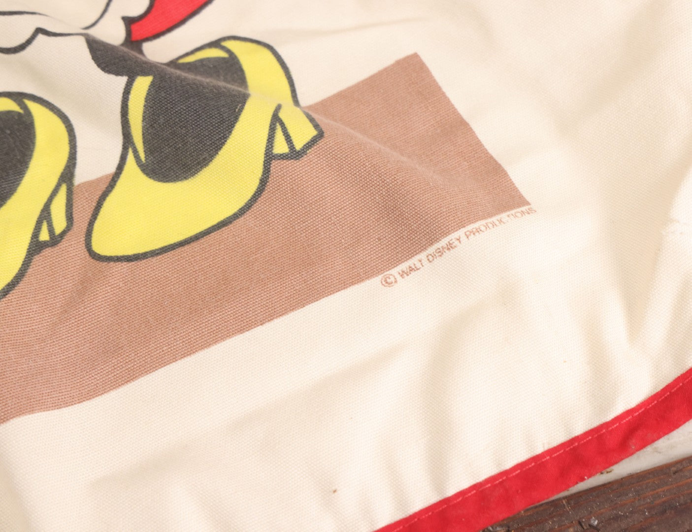 Lot 056 - Vintage Mickey And Minnie Mouse Printed Chef's Apron With Red Trim, Copyright Walt Disney Productions