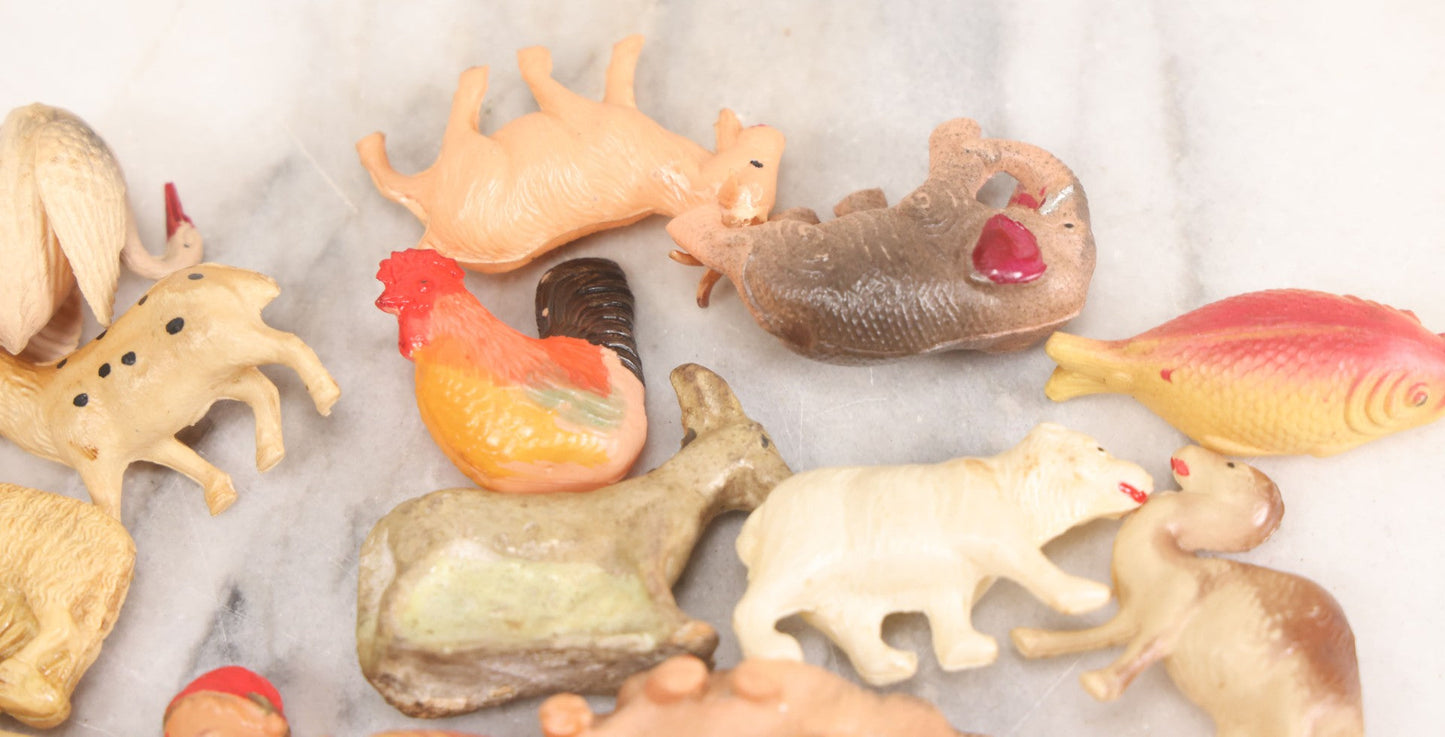 Lot 058 - Box Lot Grouping Of 19 Vintage Celluloid Dolls And Animal Toys Including Hippo, Elephant, Polar Bear, Camel, Donkey, Fish, And More
