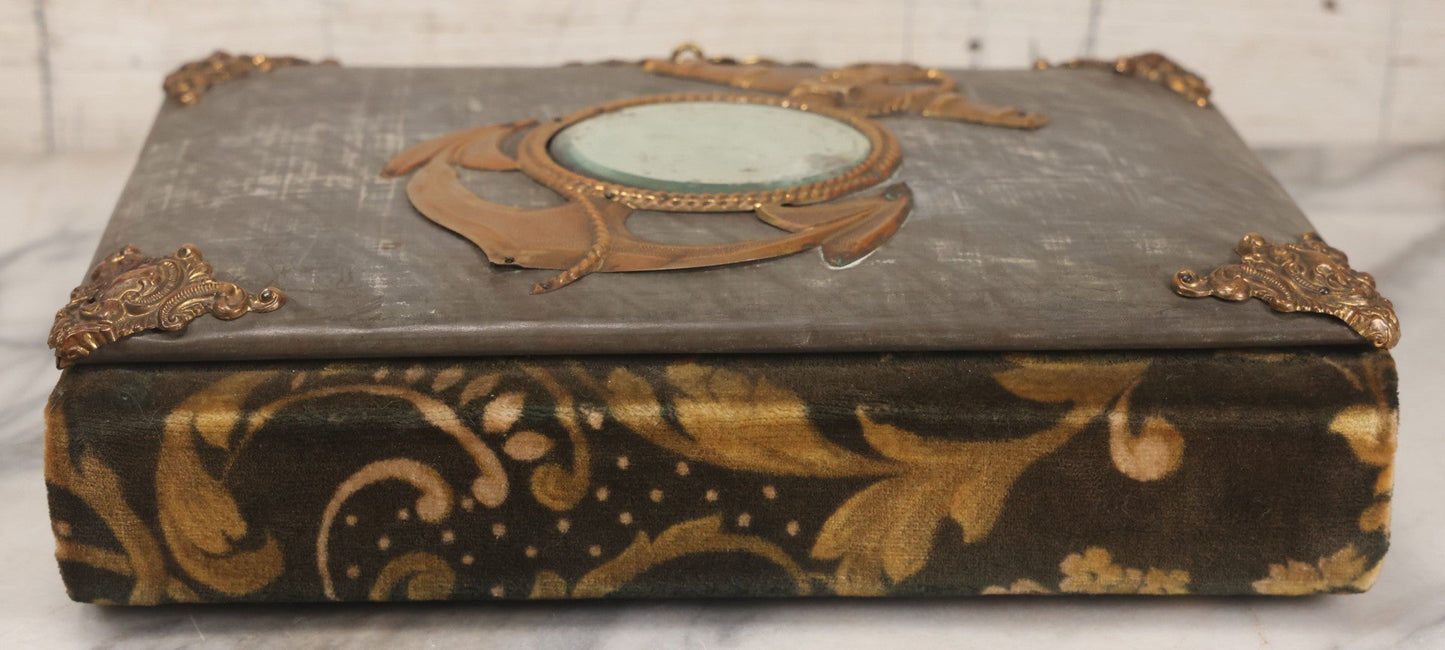 Lot 061 - Antique Victorian Photo Album With Tin Cover And Pressed Brass Anchor "Hope" Motif With Worn Beveled Glass Mirror, And Green Velvet Backing Containing 40+ Cabinet Card And Other Photographs