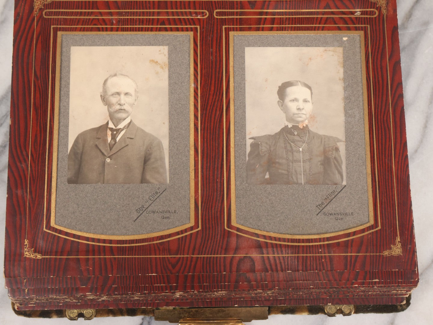 Lot 061 - Antique Victorian Photo Album With Tin Cover And Pressed Brass Anchor "Hope" Motif With Worn Beveled Glass Mirror, And Green Velvet Backing Containing 40+ Cabinet Card And Other Photographs