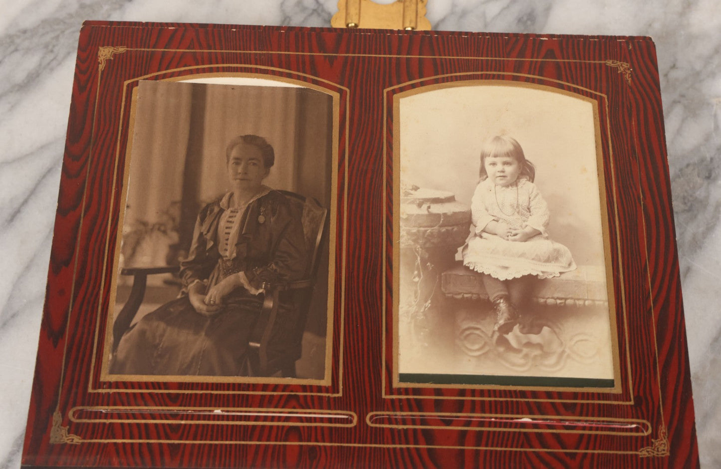 Lot 061 - Antique Victorian Photo Album With Tin Cover And Pressed Brass Anchor "Hope" Motif With Worn Beveled Glass Mirror, And Green Velvet Backing Containing 40+ Cabinet Card And Other Photographs