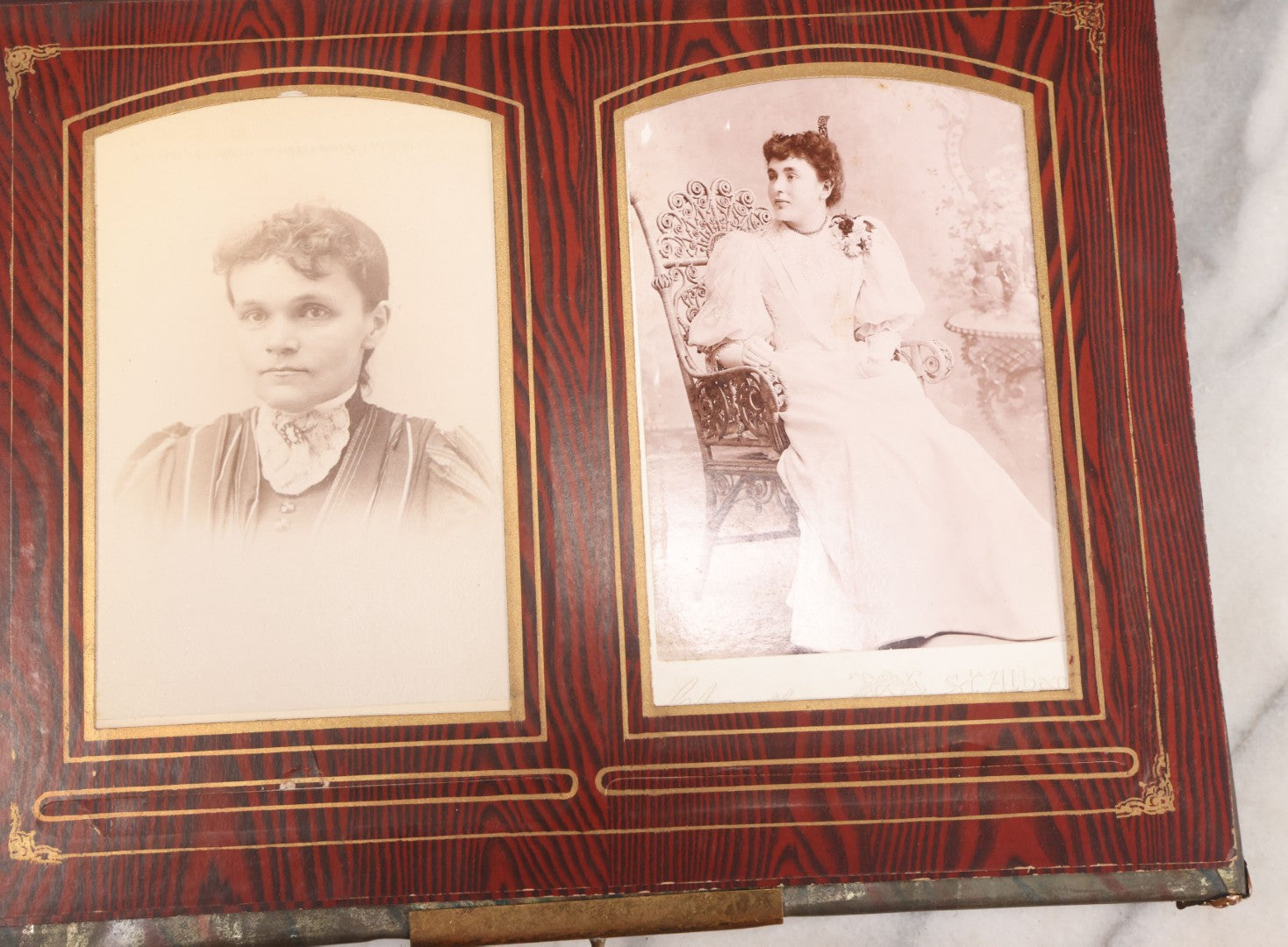 Lot 061 - Antique Victorian Photo Album With Tin Cover And Pressed Brass Anchor "Hope" Motif With Worn Beveled Glass Mirror, And Green Velvet Backing Containing 40+ Cabinet Card And Other Photographs