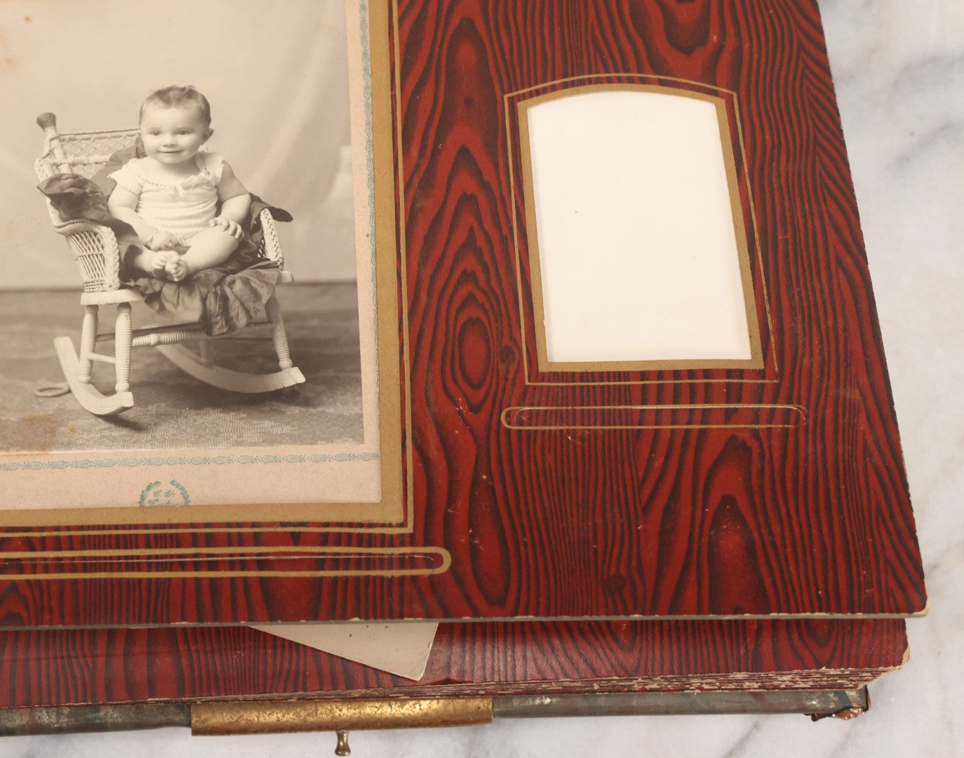 Lot 061 - Antique Victorian Photo Album With Tin Cover And Pressed Brass Anchor "Hope" Motif With Worn Beveled Glass Mirror, And Green Velvet Backing Containing 40+ Cabinet Card And Other Photographs