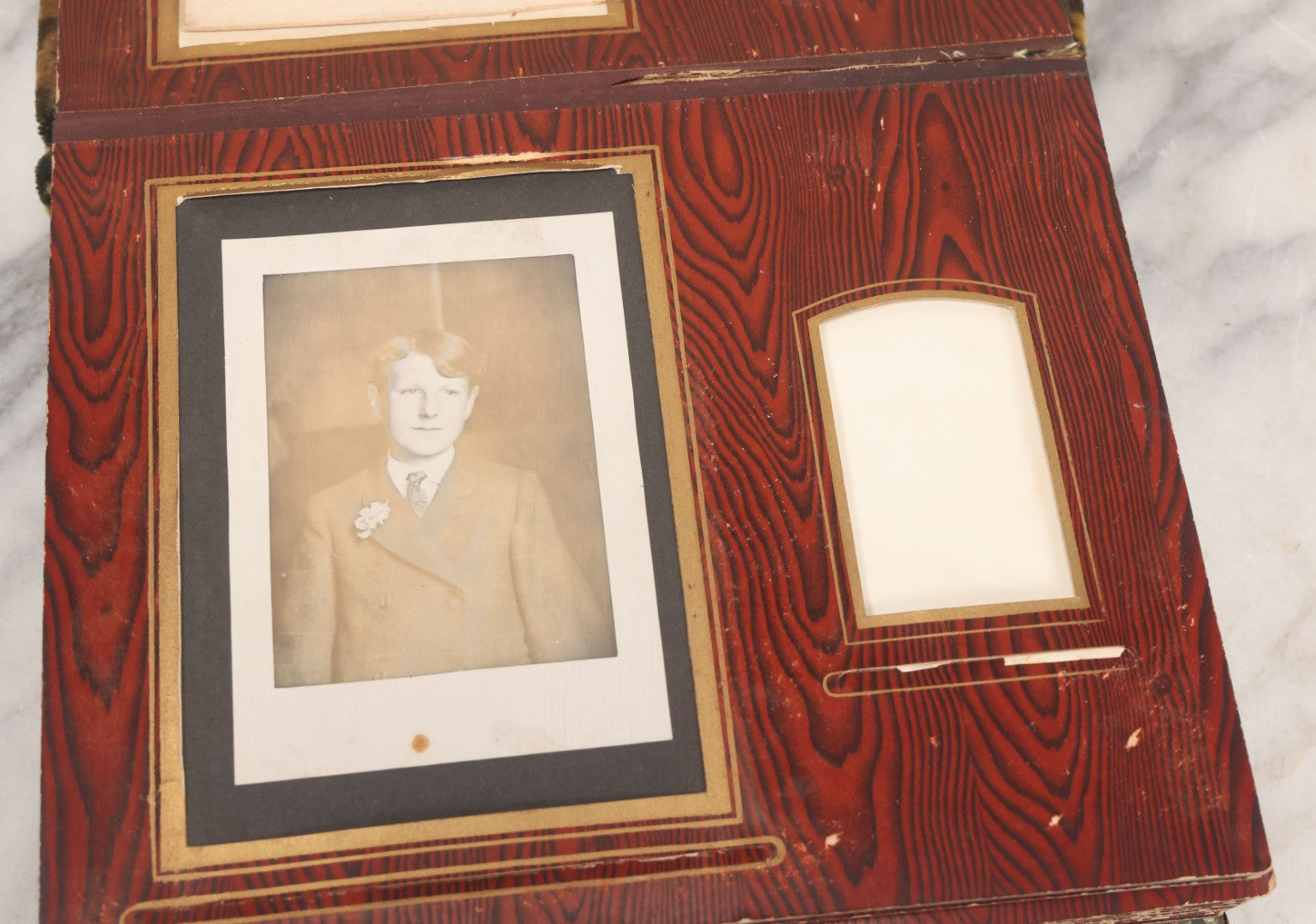 Lot 061 - Antique Victorian Photo Album With Tin Cover And Pressed Brass Anchor "Hope" Motif With Worn Beveled Glass Mirror, And Green Velvet Backing Containing 40+ Cabinet Card And Other Photographs