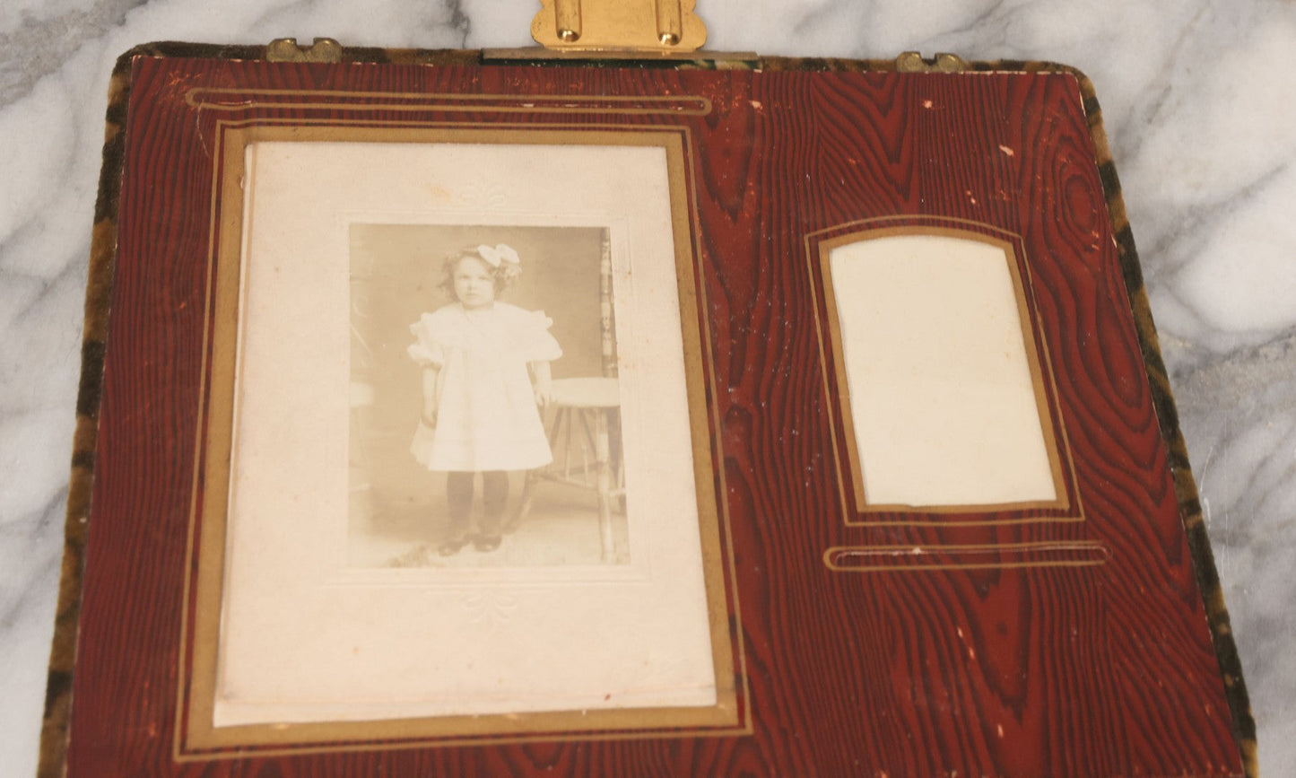 Lot 061 - Antique Victorian Photo Album With Tin Cover And Pressed Brass Anchor "Hope" Motif With Worn Beveled Glass Mirror, And Green Velvet Backing Containing 40+ Cabinet Card And Other Photographs