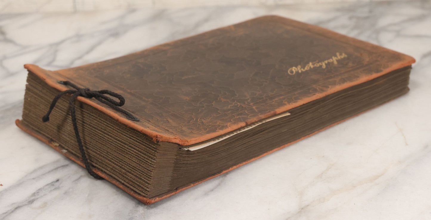 Lot 062 - Vintage Snapshot Photo Album With 125+ Photographs Including Photos Of Spirit Of St. Louis Plane, Redwood Forest, Automobiles, Outings, Comic Wedding Posters, Statue Of Liberty, Beachwear, And More