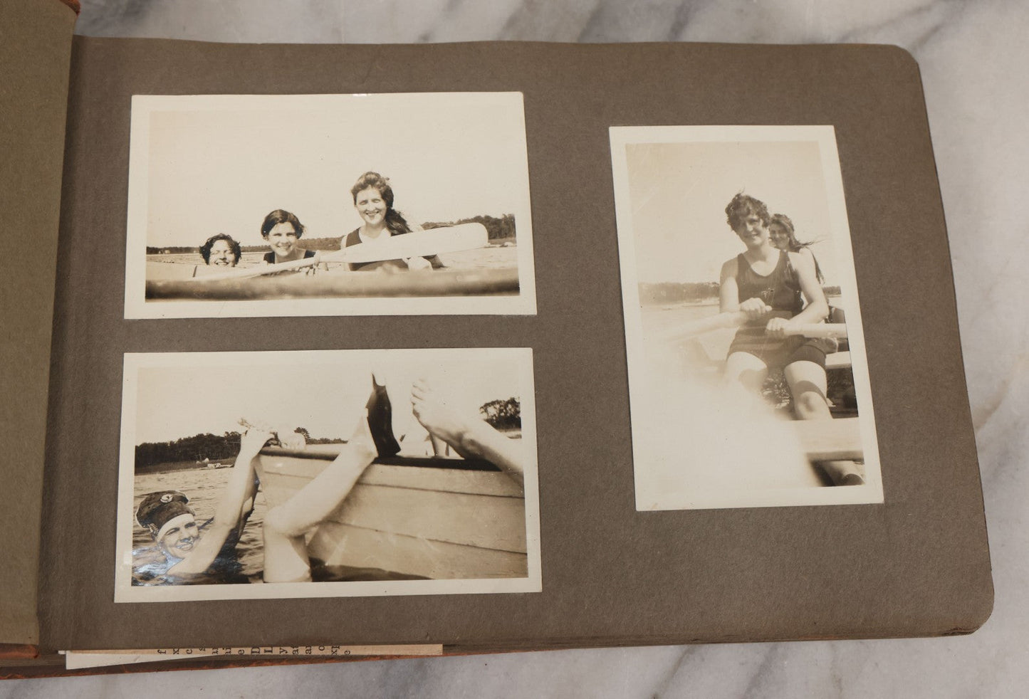 Lot 062 - Vintage Snapshot Photo Album With 125+ Photographs Including Photos Of Spirit Of St. Louis Plane, Redwood Forest, Automobiles, Outings, Comic Wedding Posters, Statue Of Liberty, Beachwear, And More