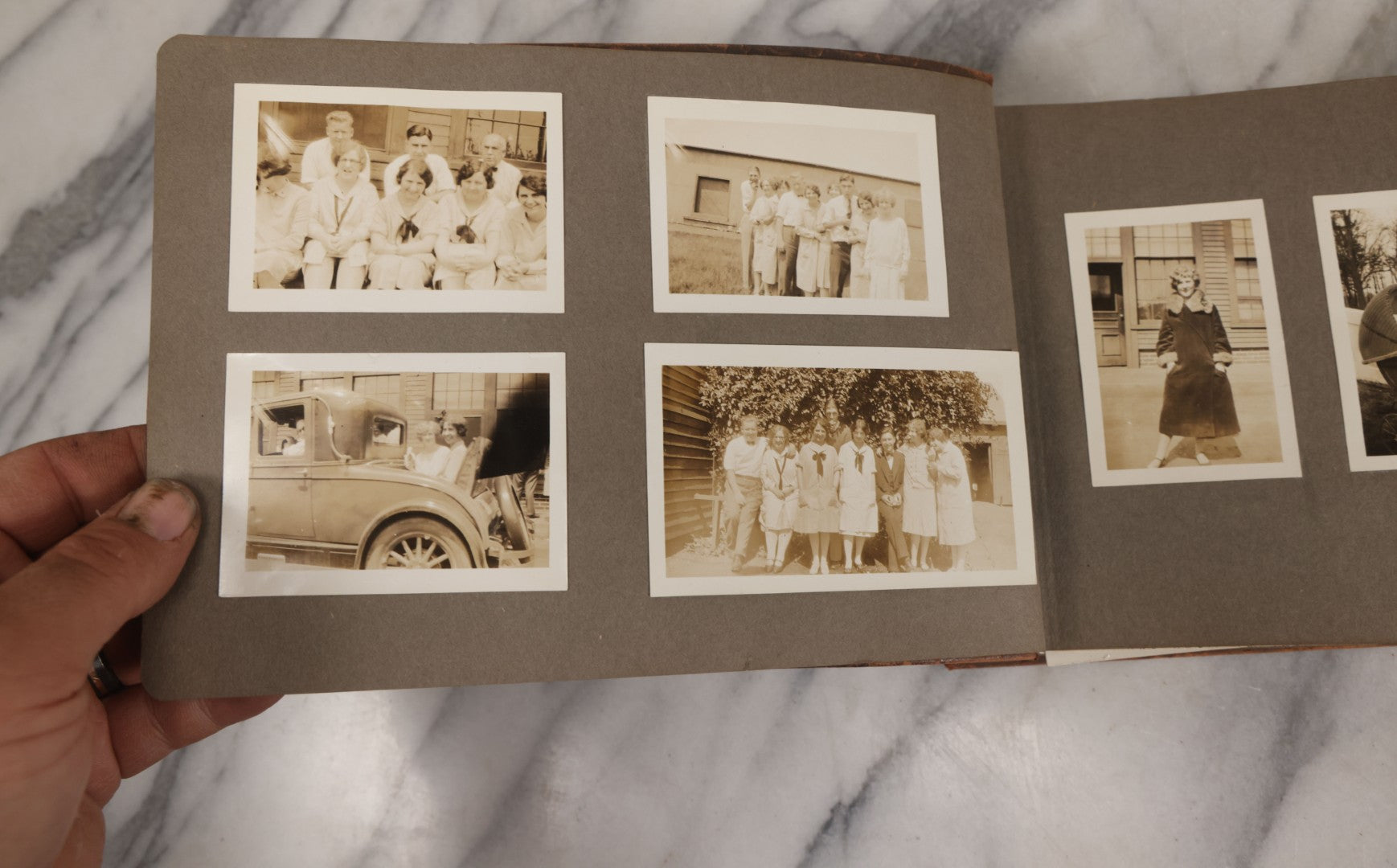 Lot 062 - Vintage Snapshot Photo Album With 125+ Photographs Including Photos Of Spirit Of St. Louis Plane, Redwood Forest, Automobiles, Outings, Comic Wedding Posters, Statue Of Liberty, Beachwear, And More