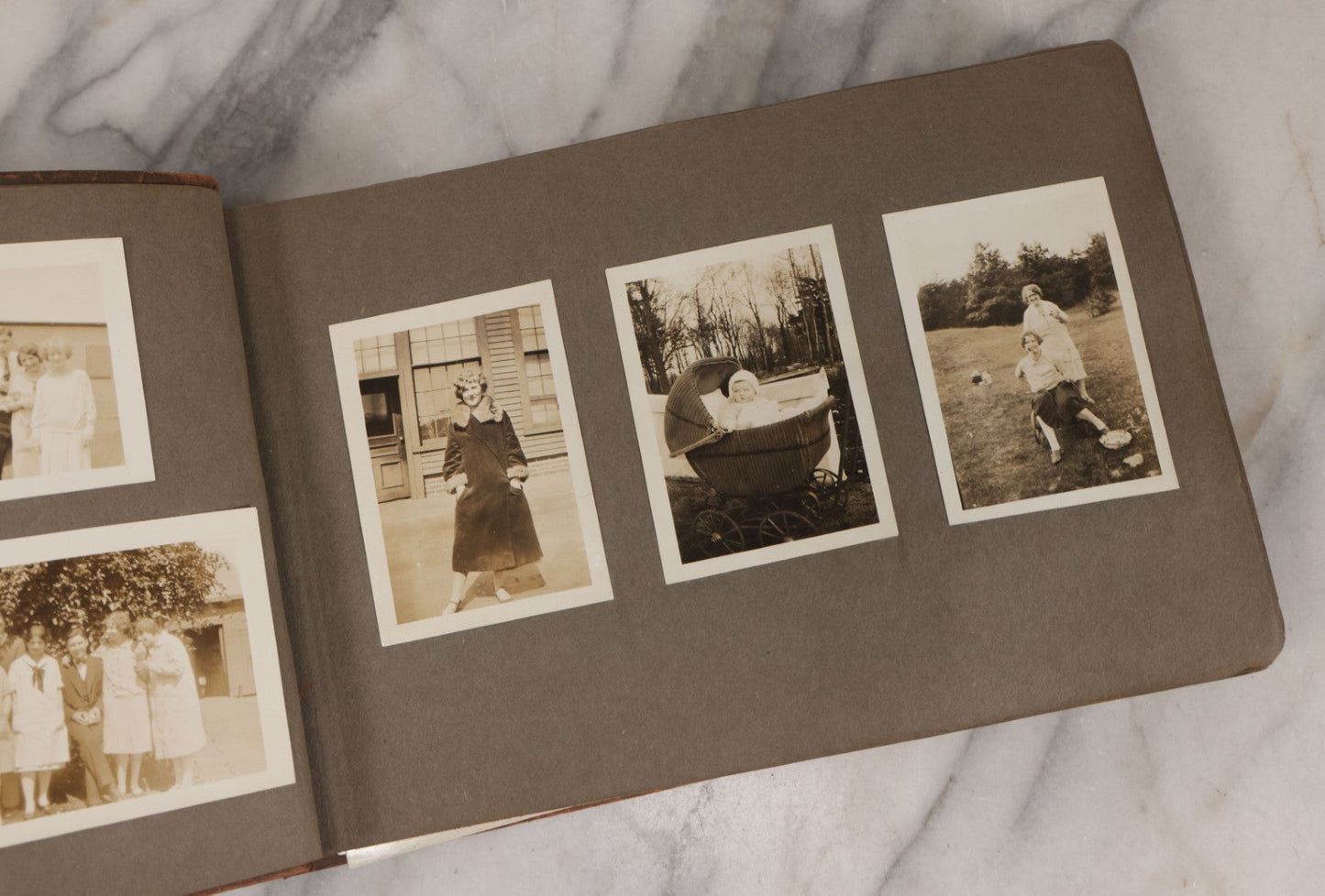 Lot 062 - Vintage Snapshot Photo Album With 125+ Photographs Including Photos Of Spirit Of St. Louis Plane, Redwood Forest, Automobiles, Outings, Comic Wedding Posters, Statue Of Liberty, Beachwear, And More