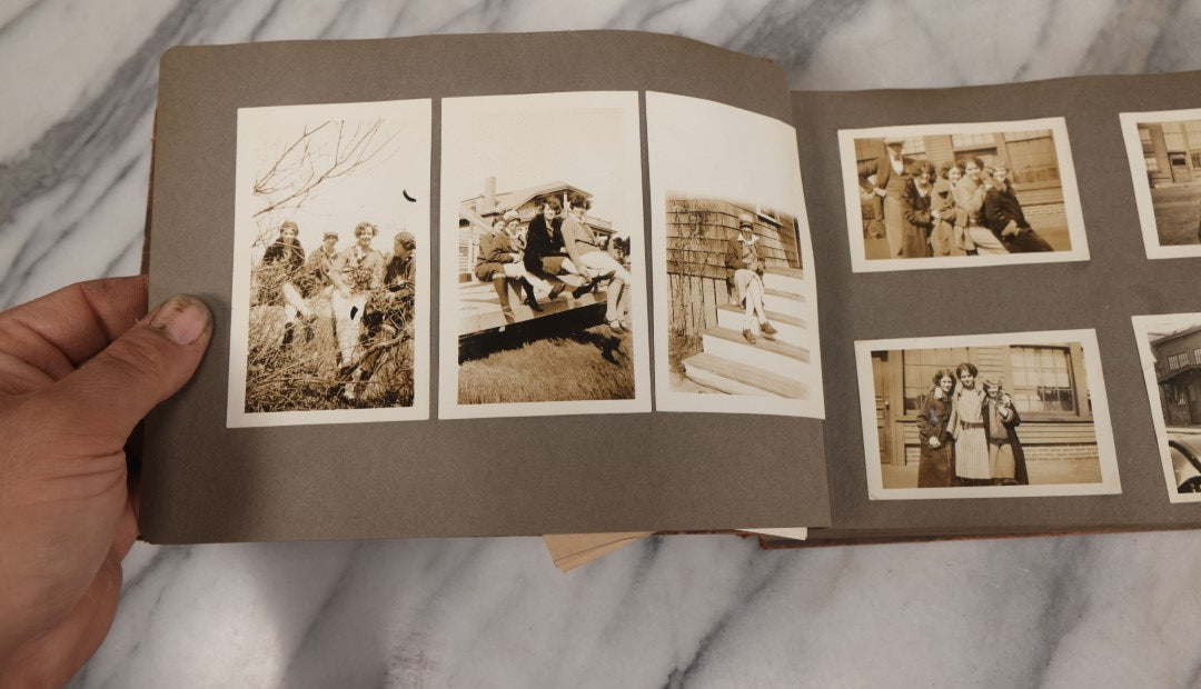 Lot 062 - Vintage Snapshot Photo Album With 125+ Photographs Including Photos Of Spirit Of St. Louis Plane, Redwood Forest, Automobiles, Outings, Comic Wedding Posters, Statue Of Liberty, Beachwear, And More