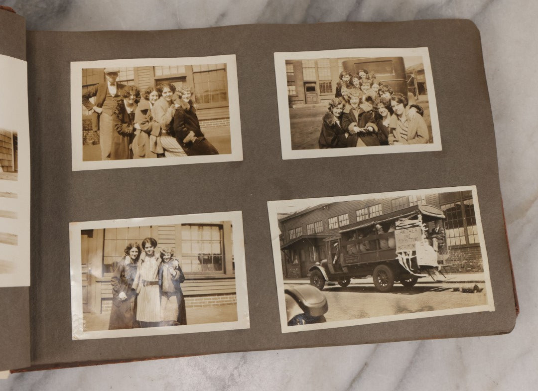 Lot 062 - Vintage Snapshot Photo Album With 125+ Photographs Including Photos Of Spirit Of St. Louis Plane, Redwood Forest, Automobiles, Outings, Comic Wedding Posters, Statue Of Liberty, Beachwear, And More