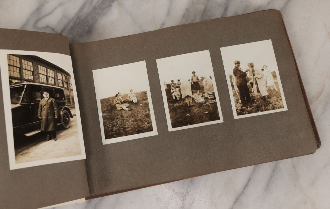 Lot 062 - Vintage Snapshot Photo Album With 125+ Photographs Including Photos Of Spirit Of St. Louis Plane, Redwood Forest, Automobiles, Outings, Comic Wedding Posters, Statue Of Liberty, Beachwear, And More