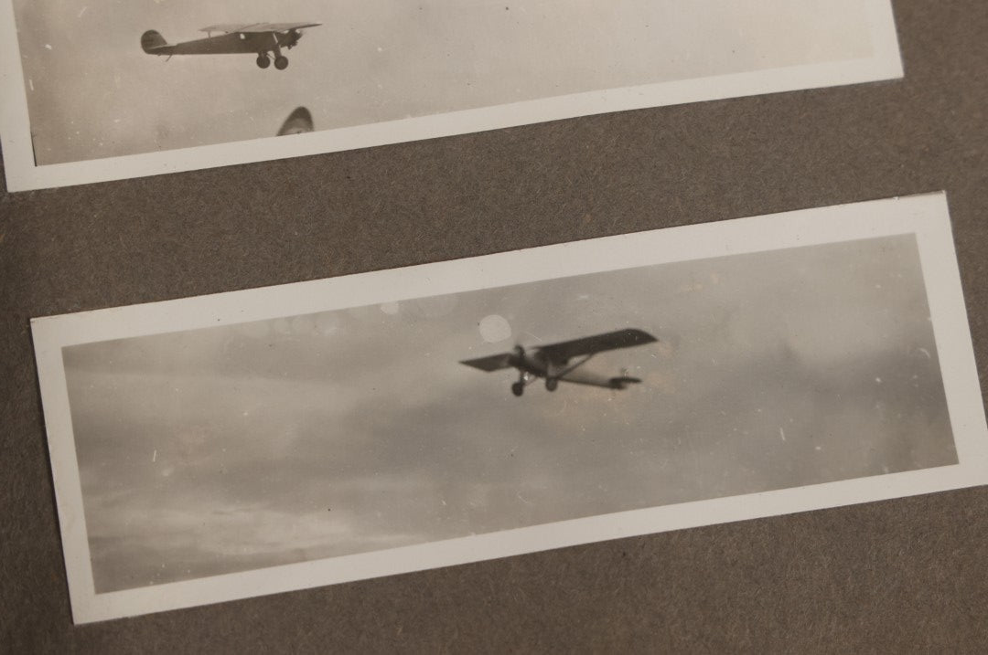 Lot 062 - Vintage Snapshot Photo Album With 125+ Photographs Including Photos Of Spirit Of St. Louis Plane, Redwood Forest, Automobiles, Outings, Comic Wedding Posters, Statue Of Liberty, Beachwear, And More