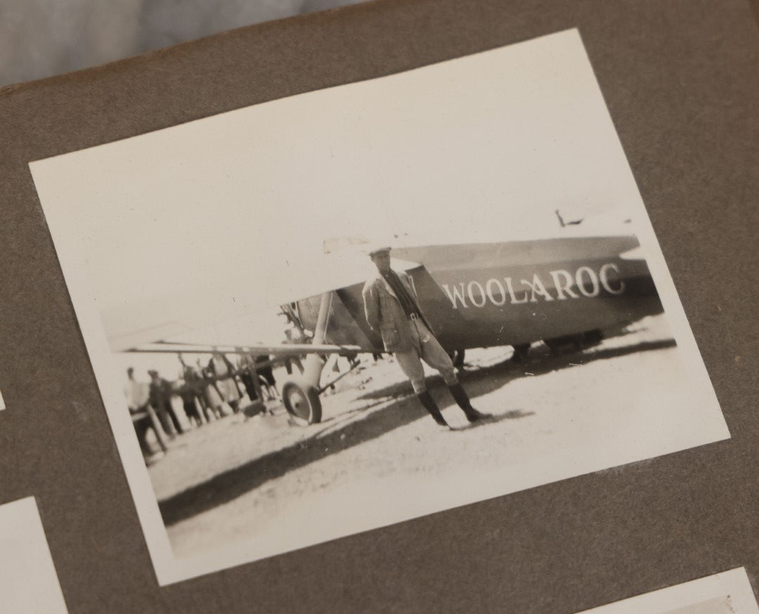 Lot 062 - Vintage Snapshot Photo Album With 125+ Photographs Including Photos Of Spirit Of St. Louis Plane, Redwood Forest, Automobiles, Outings, Comic Wedding Posters, Statue Of Liberty, Beachwear, And More