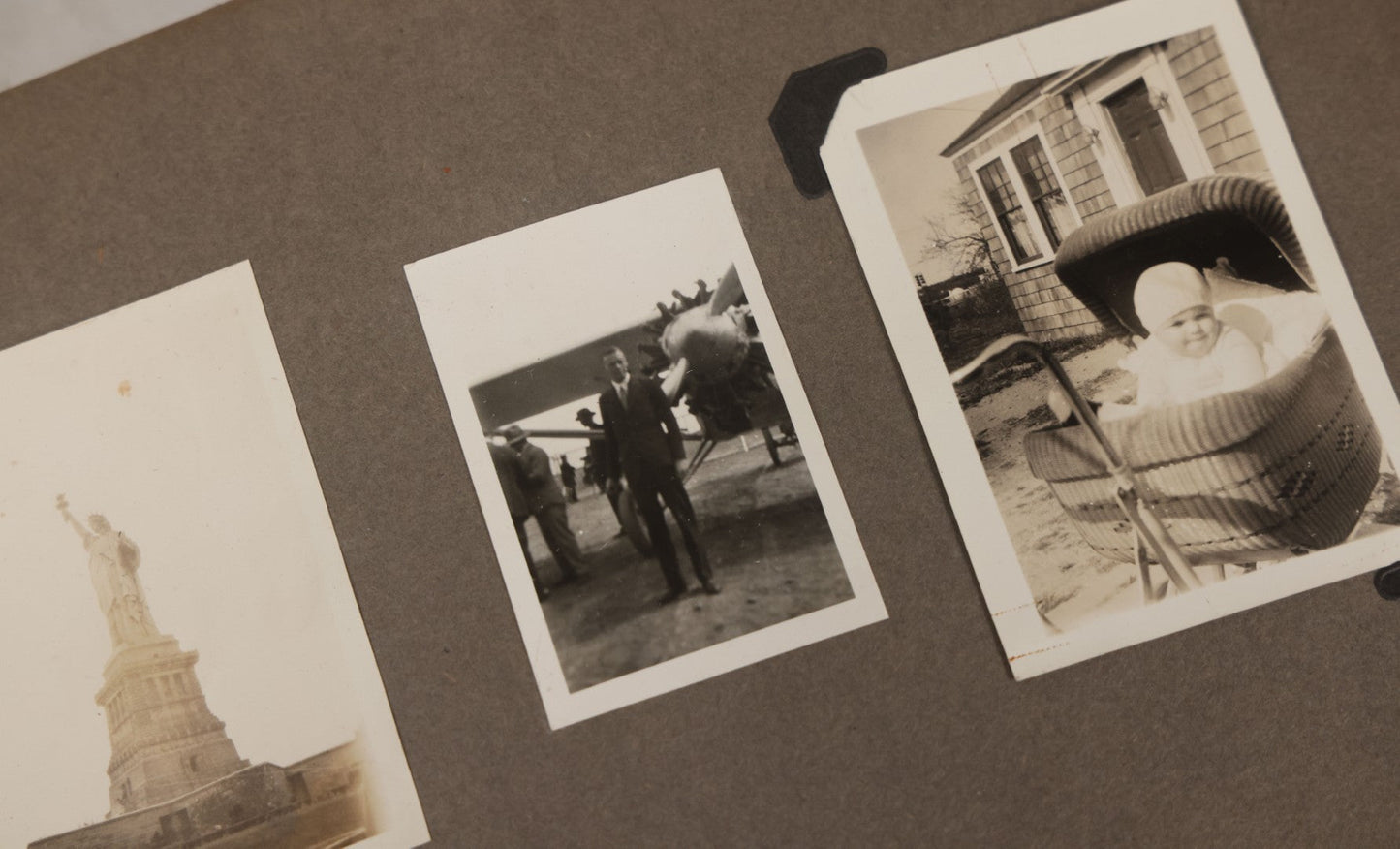 Lot 062 - Vintage Snapshot Photo Album With 125+ Photographs Including Photos Of Spirit Of St. Louis Plane, Redwood Forest, Automobiles, Outings, Comic Wedding Posters, Statue Of Liberty, Beachwear, And More